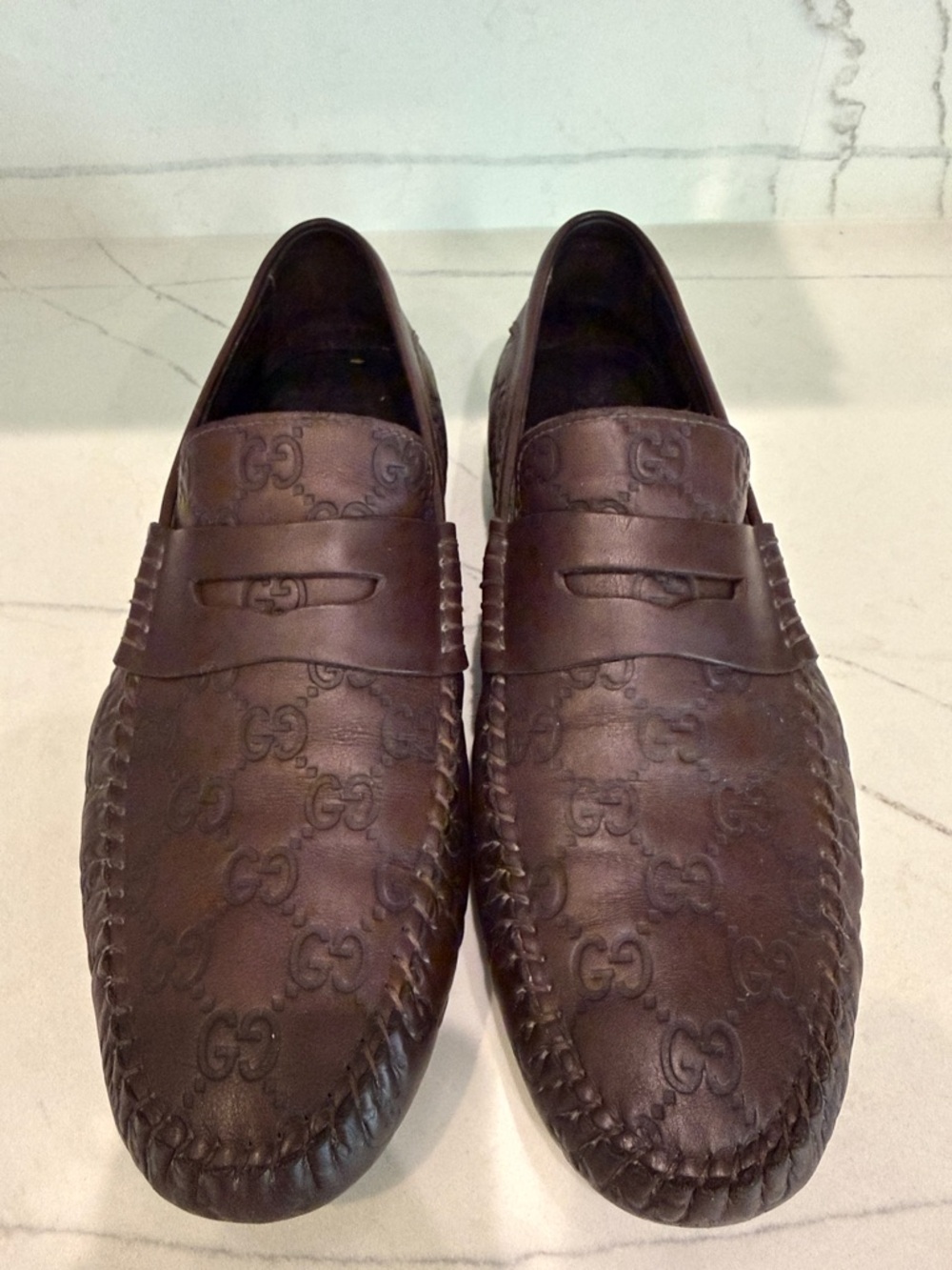 Gucci Brown Embossed GG Leather Penny Loafers